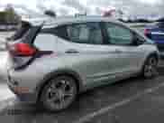 2018 Chevrolet Bolt EV Premier with VIN 1G1FX6S01J4134041, listed as a Copart auction lot 82892843 with 79,703 mi miles and . Bid and sale history available at DreamBid. Image 3.