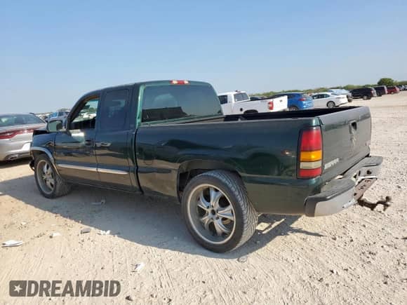 2004 GMC Sierra 1500 SLE with VIN 2GTEC19V641207813, listed as a Copart auction lot 71743215 with 208,365 mi miles and Salvage title. Bid and sale history available at DreamBid. Image 2.