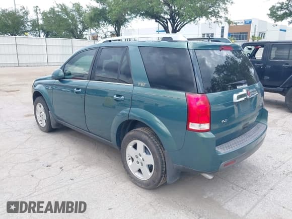 ✅ 2006 Saturn VUE • VIN: 5GZCZ53406S829936 • Lot: 42469354. Listed on IAAI with 133,515 mi. Free auction sales archive from the USA and detailed vehicle history report at DreamBid. Image 3.