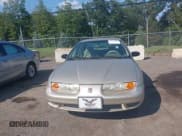 ✅ 2002 Saturn SL • VIN: 1G8ZH52812Z227514 • Lot: 42859934. Listed on IAAI with 84,221 mi. Free auction sales archive from the USA and detailed vehicle history report at DreamBid. Image 6.