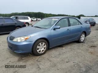 ✅ 2002 Toyota Camry LE • VIN: 4T1BE32K52U608498 • Lot: 67666465. Listed on Copart with 154,349 mi. Free auction sales archive from the USA and detailed vehicle history report at DreamBid. Image 1.