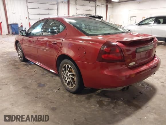 ✅ 2004 Pontiac Grand Prix GTP • VIN: 2G2WR524241132365 • Lot: 42561108. Listed on IAAI with 201,602 mi. Free auction sales archive from the USA and detailed vehicle history report at DreamBid. Image 3.