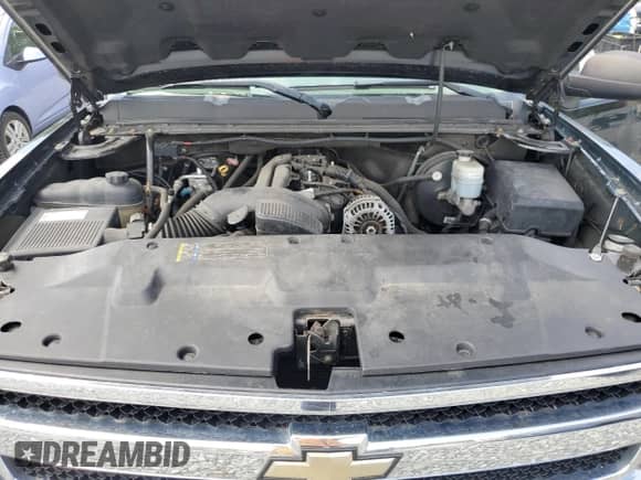 2009 Chevrolet Silverado 1500 LS z VIN 3GCEK13C99G145395, wystawiony jako Copart lot #57073015 z przebiegiem 112 155 mil mil oraz Czysty tytuł • Clean title. Historia ofert i sprzedaży dostępna na DreamBid. Obrazek 11.