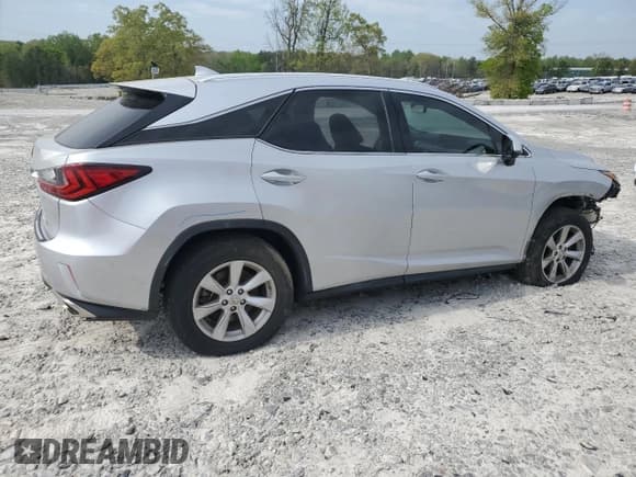 ✅ 2016 Lexus RX 350 • VIN: 2T2BZMCA4GC020161 • Lot: 52846525. Listed on Copart with 154,391 mi. Free auction sales archive from the USA and detailed vehicle history report at DreamBid. Image 3.