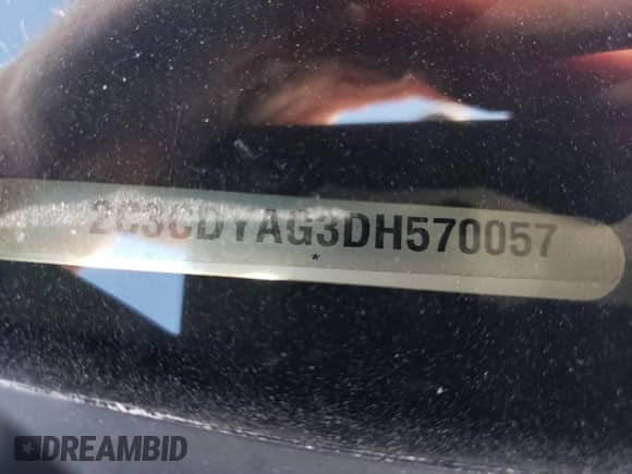 2013 Dodge Challenger SXT z VIN 2C3CDYAG3DH570057, wystawiony jako Copart lot #60176214 z przebiegiem Nie podano mil oraz Szkoda całkowita • Salvage title. Historia ofert i sprzedaży dostępna na DreamBid. Obrazek 13.