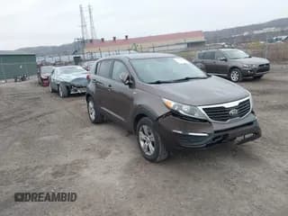 ✅ 2013 Kia Sportage LX • VIN: KNDPBCA2XD7499560 • Lot: 43779256. Listed on IAAI with 124,583 mi. Free auction sales archive from the USA and detailed vehicle history report at DreamBid. Image 1.