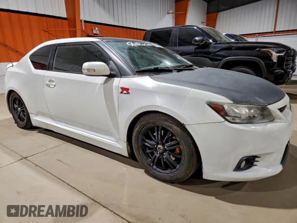 ✅ 2011 Scion tC • VIN: JTKJF5C79B3006656 • Lot: 94375385. Listed on Copart with 406,510 mi. Free auction sales archive from the USA and detailed vehicle history report at DreamBid. Image 4.