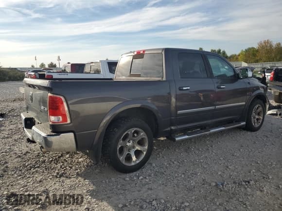 ✅ 2015 Ram 1500 Laramie • VIN: 1C6RR7NM2FS609290 • Лот: 81998225. Опубликован ранее на Copart с пробегом 163 461 миль. Бесплатный доступ к архиву аукционных продаж из США и подробный отчёт об истории автомобиля на DreamBid. Изображение 3.