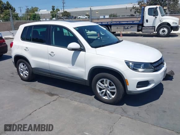 ✅ 2012 Volkswagen Tiguan SE • VIN: WVGAV7AX4CW603198 • Lot: 42581562. Listed on IAAI with 119,739 mi. Free auction sales archive from the USA and detailed vehicle history report at DreamBid. Image 1.