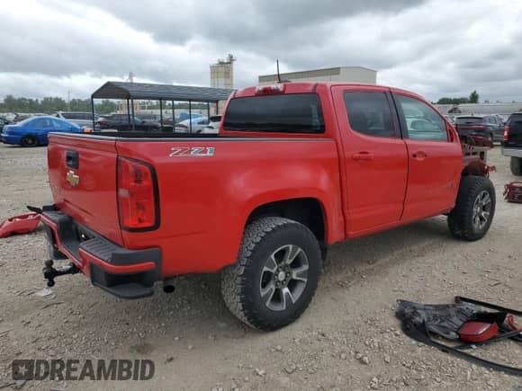 2015 Chevrolet Colorado 4WD Z71 with VIN 1GCGTCE37F1178419, listed as a Copart auction lot 64413185 with 221,487 mi miles and Salvage title. Bid and sale history available at DreamBid. Image 3.