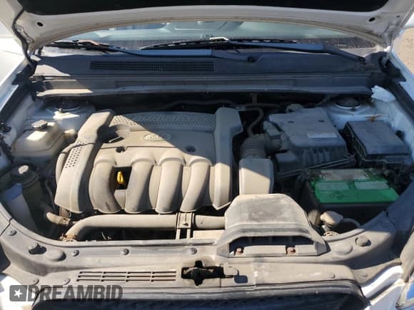 ✅ 2007 Kia Rondo LX • VIN: KNAFG525177086946 • Lot: 85117845. Listed on Copart with 58,293 mi. Free auction sales archive from the USA and detailed vehicle history report at DreamBid. Image 11.