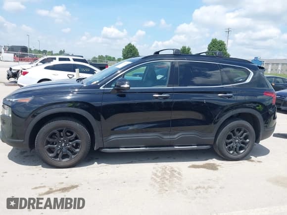 ✅ 2022 Hyundai Santa Fe SEL • VIN: 5NMS6DAJ0NH411847 • Лот: 42525578. Опубликован ранее на IAAI с пробегом 53 808 миль. Бесплатный доступ к архиву аукционных продаж из США и подробный отчёт об истории автомобиля на DreamBid. Изображение 14.