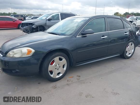 ✅ 2014 Chevrolet Impala LTZ • VIN: 2G1WC5E3XE1189956 • Lot: 43718567. Listed on IAAI with 142,559 mi. Free auction sales archive from the USA and detailed vehicle history report at DreamBid. Image 21.