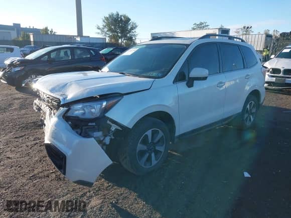 2018 Subaru Forester Limited with VIN JF2SJAJC3JH400496, listed as a IAAI auction lot 43511294 with 124,701 mi miles and . Bid and sale history available at DreamBid. Image 2.