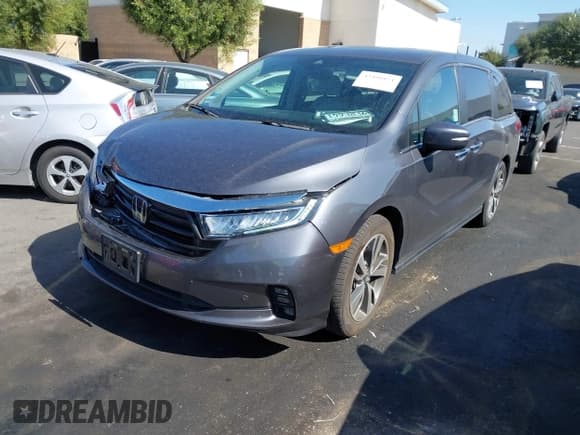 ✅ 2023 Honda Odyssey Touring • VIN: 5FNRL6H84PB018606 • Лот: 43496824. Опубликован ранее на IAAI с пробегом 35 645 миль. Бесплатный доступ к архиву аукционных продаж из США и подробный отчёт об истории автомобиля на DreamBid. Изображение 2.