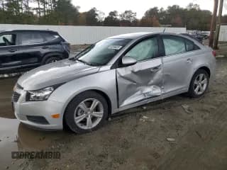 ✅ 2014 Chevrolet Cruze 2LT • VIN: 1G1PE5SBXE7338573 • Lot: 90266625. Listed on Copart with 74,700 mi. Free auction sales archive from the USA and detailed vehicle history report at DreamBid. Image 1.