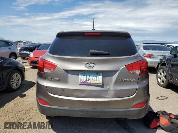 2011 Hyundai Tucson GL z VIN KM8JT3AB7BU200443, wystawiony jako Copart lot #69025884 z przebiegiem 186 588 mil mil oraz Czysty tytuł • Clean title. Historia ofert i sprzedaży dostępna na DreamBid. Obrazek 6.