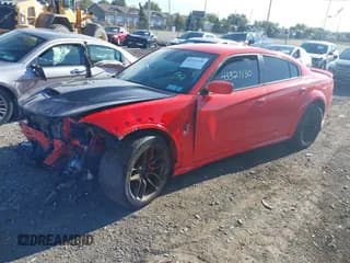 ✅ 2022 Dodge Charger SRT Hellcat Widebody • VIN: 2C3CDXL9XNH159586 • Lot: 43327130. Wystawiony na IAAI z przebiegiem 38 621 mil. Bezpłatny archiwum sprzedaży aukcyjnych z USA i szczegółowy raport historii pojazdu na DreamBid. Zdjęcie 2.