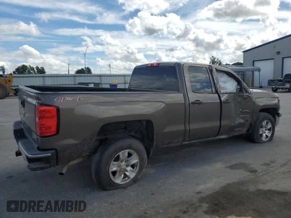 2014 Chevrolet Silverado 1500 LT с VIN 1GCVKREC3EZ300772, выставлен на аукционе Copart как лот 70127165 с пробегом 208 135 миль миль и Списание • Salvage title. История ставок и продаж доступна на DreamBid. Изображение 3.