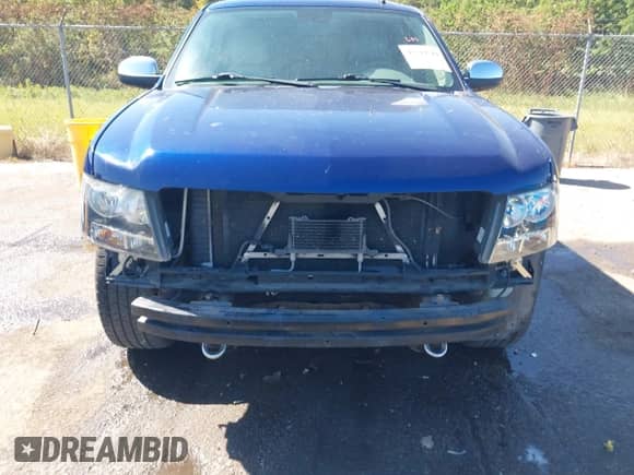 2012 Chevrolet Tahoe LT z VIN 1GNSCBE03CR170946, wystawiony jako IAAI lot #43513512 z przebiegiem 82 359 mil mil oraz . Historia ofert i sprzedaży dostępna na DreamBid. Obrazek 6.