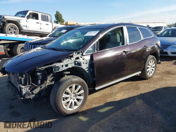 ✅ 2012 Mazda CX-7 i Touring • VIN: JM3ER2CM1C0412090 • Lot: 43807986. Wystawiony na IAAI z przebiegiem 133 874 mil. Bezpłatny archiwum sprzedaży aukcyjnych z USA i szczegółowy raport historii pojazdu na DreamBid. Zdjęcie 2.