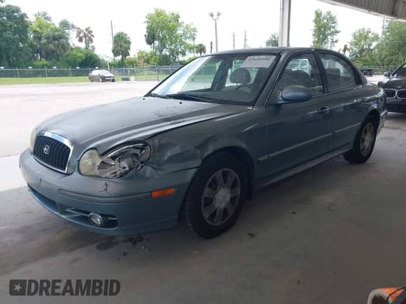 2004 Hyundai Sonata with VIN KMHWF25H64A045393, listed as a IAAI auction lot 42645956 with 114,112 mi miles and . Bid and sale history available at DreamBid. Image 2.