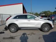 ✅ 2021 Cadillac XT4 FWD Premium Luxury • VIN: 1GYFZCR4XMF080010 • Лот: 42098802. Опубликован ранее на IAAI с пробегом 34 402 миль. Бесплатный доступ к архиву аукционных продаж из США и подробный отчёт об истории автомобиля на DreamBid. Изображение 13.