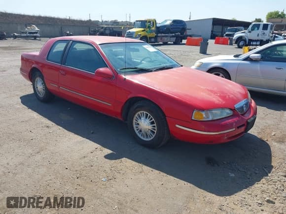 ✅ 1996 Mercury Cougar • VIN: 1MELM6242TH607364 • Lot: 42968383. Listed on IAAI with 130,625 mi. Free auction sales archive from the USA and detailed vehicle history report at DreamBid. Image 1.