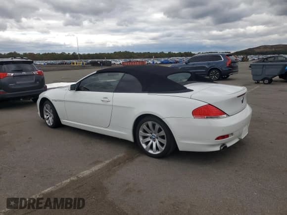 ✅ 2007 BMW 6 Series 650i • VIN: WBAEK13517CN84217 • Lot: 87413775. Wystawiony na Copart z przebiegiem 92 851 mil. Bezpłatny archiwum sprzedaży aukcyjnych z USA i szczegółowy raport historii pojazdu na DreamBid. Zdjęcie 2.