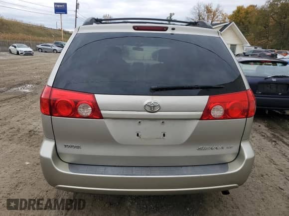 2009 Toyota Sienna LE z VIN 5TDZK23C79S272185, wystawiony jako Copart lot #90288145 z przebiegiem 272 534 mil mil oraz Czysty tytuł • Clean title. Historia ofert i sprzedaży dostępna na DreamBid. Obrazek 6.