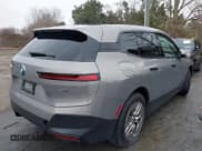 ✅ 2023 BMW iX xDrive50 • VIN: WB523CF01PCM04342 • Lot: 41421326. Wystawiony na IAAI z przebiegiem Nie podano. Bezpłatny archiwum sprzedaży aukcyjnych z USA i szczegółowy raport historii pojazdu na DreamBid. Zdjęcie 4.