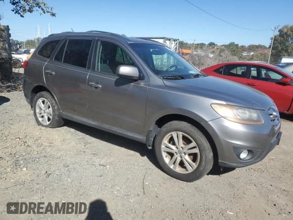 ✅ 2011 Hyundai Santa Fe Limited • VIN: 5XYZK3AB3BG044073 • Lot: 77100334. Listed on Copart with 216,892 mi. Free auction sales archive from the USA and detailed vehicle history report at DreamBid. Image 4.