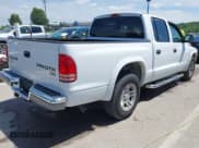 ✅ 2003 Dodge Dakota SLT • VIN: 1D7HL48X73S126440 • Lot: 42330513. Wystawiony na IAAI z przebiegiem 223 959 mil. Bezpłatny archiwum sprzedaży aukcyjnych z USA i szczegółowy raport historii pojazdu na DreamBid. Zdjęcie 4.