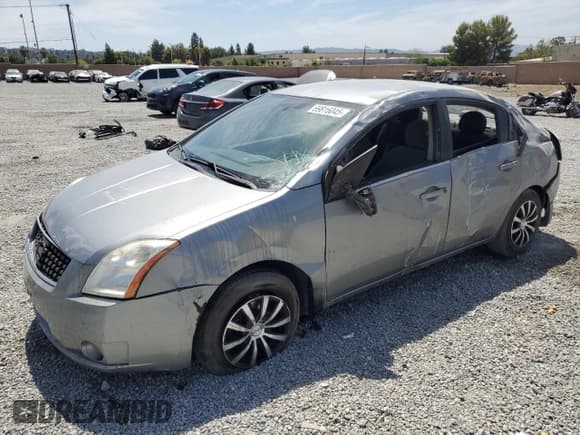 ✅ 2008 Nissan Sentra 2.0 • VIN: 3N1AB61E98L700113 • Лот: 69816045. Опубликован ранее на Copart с пробегом 180 866 миль. Бесплатный доступ к архиву аукционных продаж из США и подробный отчёт об истории автомобиля на DreamBid. Изображение 1.