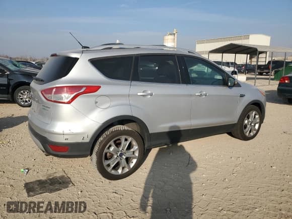 ✅ 2014 Ford Escape Titanium • VIN: 1FMCU0J91EUB49463 • Lot: 93523395. Listed on Copart with 122,340 mi. Free auction sales archive from the USA and detailed vehicle history report at DreamBid. Image 3.