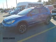✅ 2014 Subaru Crosstrek Premium • VIN: JF2GPACC2E8294940 • Lot: 43887116. Listed on IAAI with 95,110 mi. Free auction sales archive from the USA and detailed vehicle history report at DreamBid. Image 2.