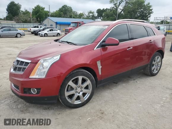 ✅ 2011 Cadillac SRX Turbo Premium Collection • VIN: 3GYFNKE61BS568848 • Лот: 57312304. Опубликован ранее на Copart с пробегом Не указан. Бесплатный доступ к архиву аукционных продаж из США и подробный отчёт об истории автомобиля на DreamBid. Изображение 1.
