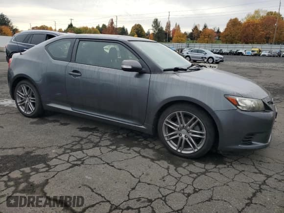 ✅ 2012 Scion tC • VIN: JTKJF5C70C3044875 • Lot: 85420385. Listed on Copart with 86,956 mi. Free auction sales archive from the USA and detailed vehicle history report at DreamBid. Image 4.