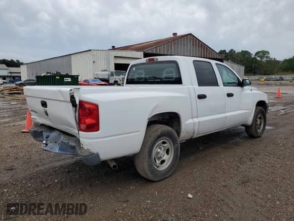 2007 Dodge Dakota ST с VIN 1D7HE28K37S200672, выставлен на аукционе Copart как лот 52682114 с пробегом 135 041 миль миль и Списание • Salvage title. История ставок и продаж доступна на DreamBid. Изображение 3.