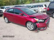 ✅ 2017 Ford Focus Titanium • VIN: 1FADP3N22HL302561 • Lot: 43252752. Listed on IAAI with 129,322 mi. Free auction sales archive from the USA and detailed vehicle history report at DreamBid. Image 1.