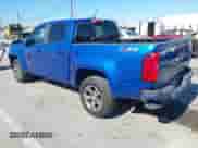 2018 Chevrolet Colorado 2WD Z71 с VIN 1GCGSDEA8J1258571, выставлен на аукционе IAAI как лот 43551377 с пробегом 99 188 миль миль и . История ставок и продаж доступна на DreamBid. Изображение 3.