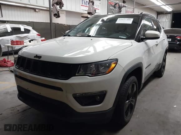 ✅ 2019 Jeep Compass Latitude • VIN: 3C4NJDBB7KT754348 • Lot: 42617408. Listed on IAAI with 59,670 mi. Free auction sales archive from the USA and detailed vehicle history report at DreamBid. Image 17.