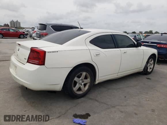 2008 Dodge Charger SXT с VIN 2B3KA33G18H214536, выставлен на аукционе Copart как лот 54944975 с пробегом 221 285 миль миль и Списание • Salvage title. История ставок и продаж доступна на DreamBid. Изображение 3.