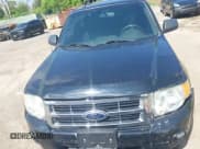 ✅ 2012 Ford Escape XLT • VIN: 1FMCU9DG3CKC30469 • Lot: 42450930. Listed on IAAI with 118,692 mi. Free auction sales archive from the USA and detailed vehicle history report at DreamBid. Image 12.