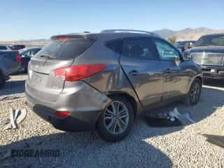 2015 Hyundai Tucson SE z VIN KM8JUCAG8FU007653, wystawiony jako Copart lot #69103044 z przebiegiem 143 509 mil mil oraz Szkoda całkowita • Salvage title. Historia ofert i sprzedaży dostępna na DreamBid. Obrazek 3.