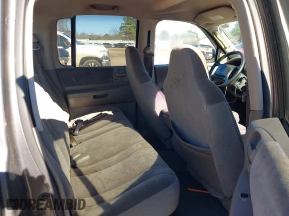 ✅ 2003 Dodge Dakota SLT • VIN: 1D7HL48X03S174569 • Lot: 41159169. Wystawiony na IAAI z przebiegiem 156 551 mil. Bezpłatny archiwum sprzedaży aukcyjnych z USA i szczegółowy raport historii pojazdu na DreamBid. Zdjęcie 8.