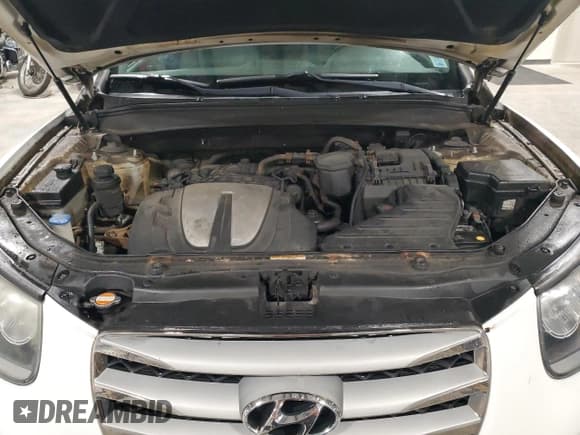 ✅ 2012 Hyundai Santa Fe GLS • VIN: 5XYZGDAG0CG145737 • Lot: 83188604. Listed on Copart with 219,523 mi. Free auction sales archive from the USA and detailed vehicle history report at DreamBid. Image 12.