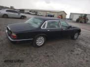 ✅ 2003 Jaguar XJ Vanden Plas • VIN: SAJDA24C33LF52131 • Лот: 84263554. Опубликован ранее на Copart с пробегом Не указан. Бесплатный доступ к архиву аукционных продаж из США и подробный отчёт об истории автомобиля на DreamBid. Изображение 3.