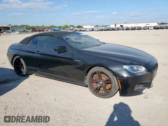 ✅ 2013 BMW M6 • VIN: WBSLZ9C54DDZ77941 • Lot: 86301075. Listed on Copart with 137,507 mi. Free auction sales archive from the USA and detailed vehicle history report at DreamBid. Image 4.