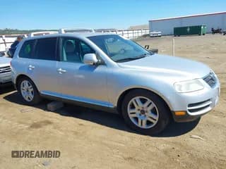 ✅ 2005 Volkswagen Touareg 4.2L V8 • VIN: WVGMM77L55D080356 • Лот: 42907691. Опубликован ранее на IAAI с пробегом 149 689 миль. Бесплатный доступ к архиву аукционных продаж из США и подробный отчёт об истории автомобиля на DreamBid. Изображение 1.